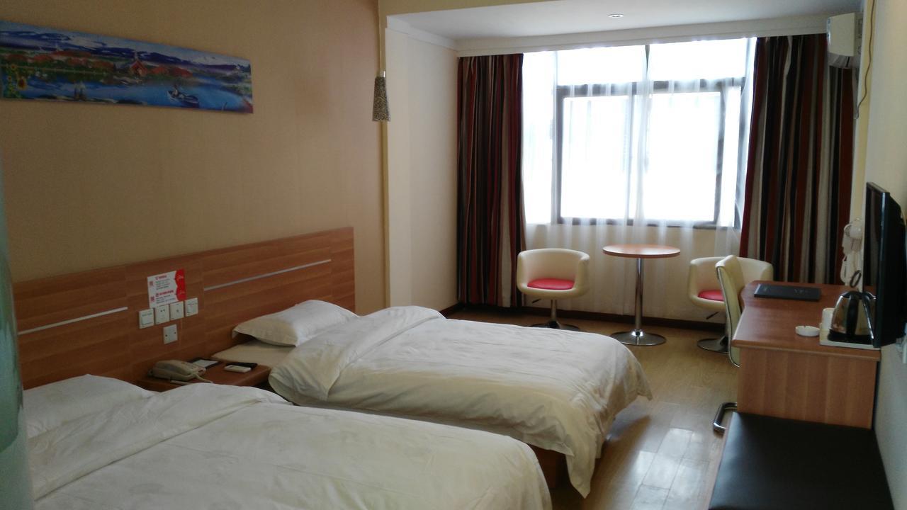 Thank Inn Chain Hotel Henan Xinyang Train Station Gongqu Road מראה חיצוני תמונה